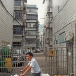 man on a bike with fruits in China