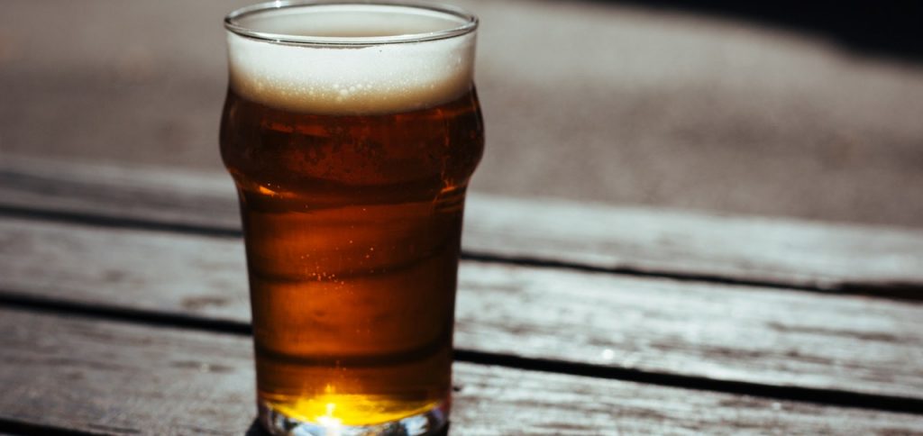 A glass with craft beer