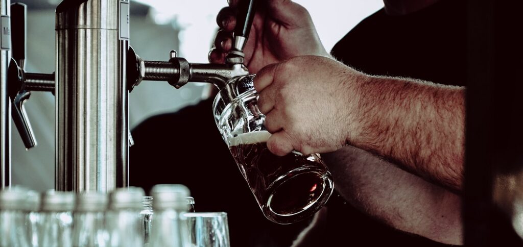 Beer glass filled at bar