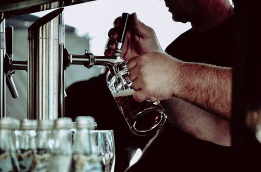 Beer glass filled at bar